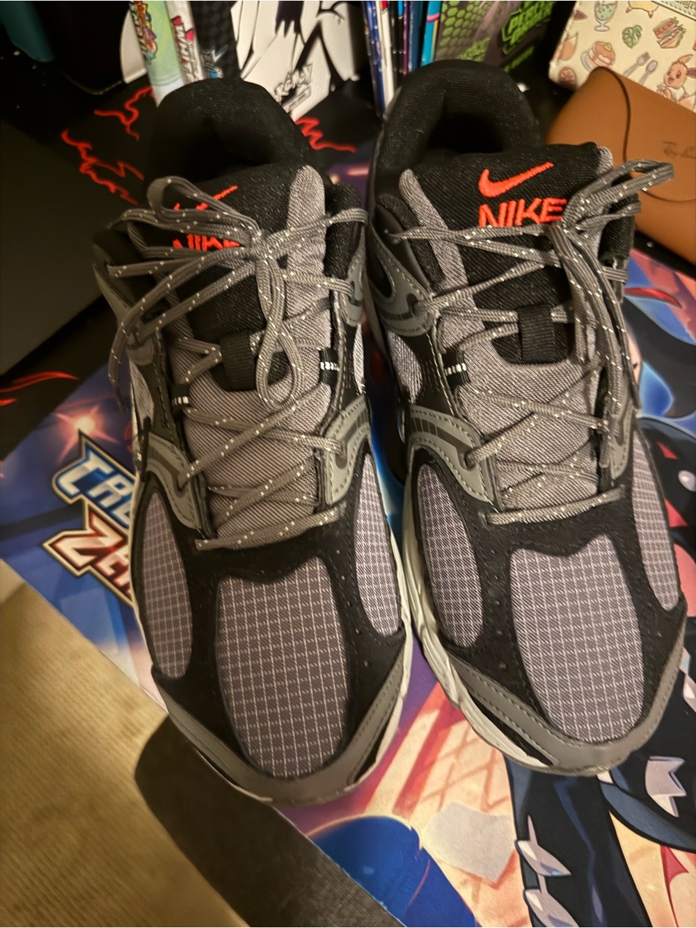 Nike Black and Gray Athletic Sneakers with Orange Branding